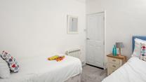 Twin beds allow for flexible sleeping arrangements for families or groups of friends.