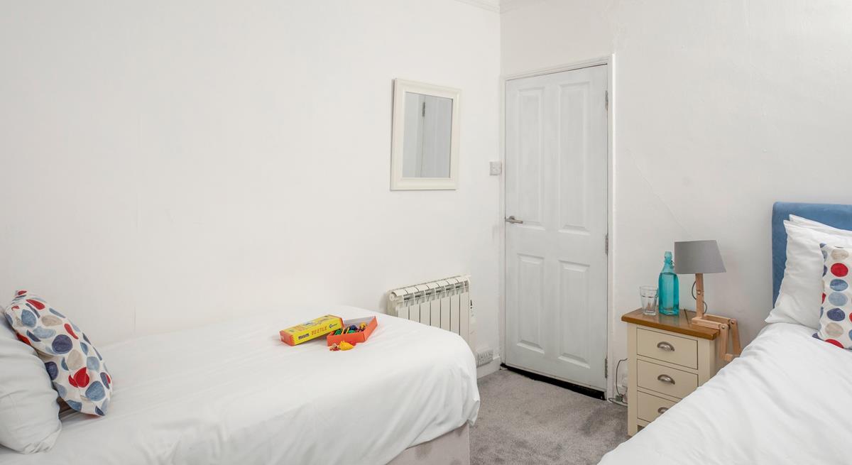 Twin beds allow for flexible sleeping arrangements for families or groups of friends.