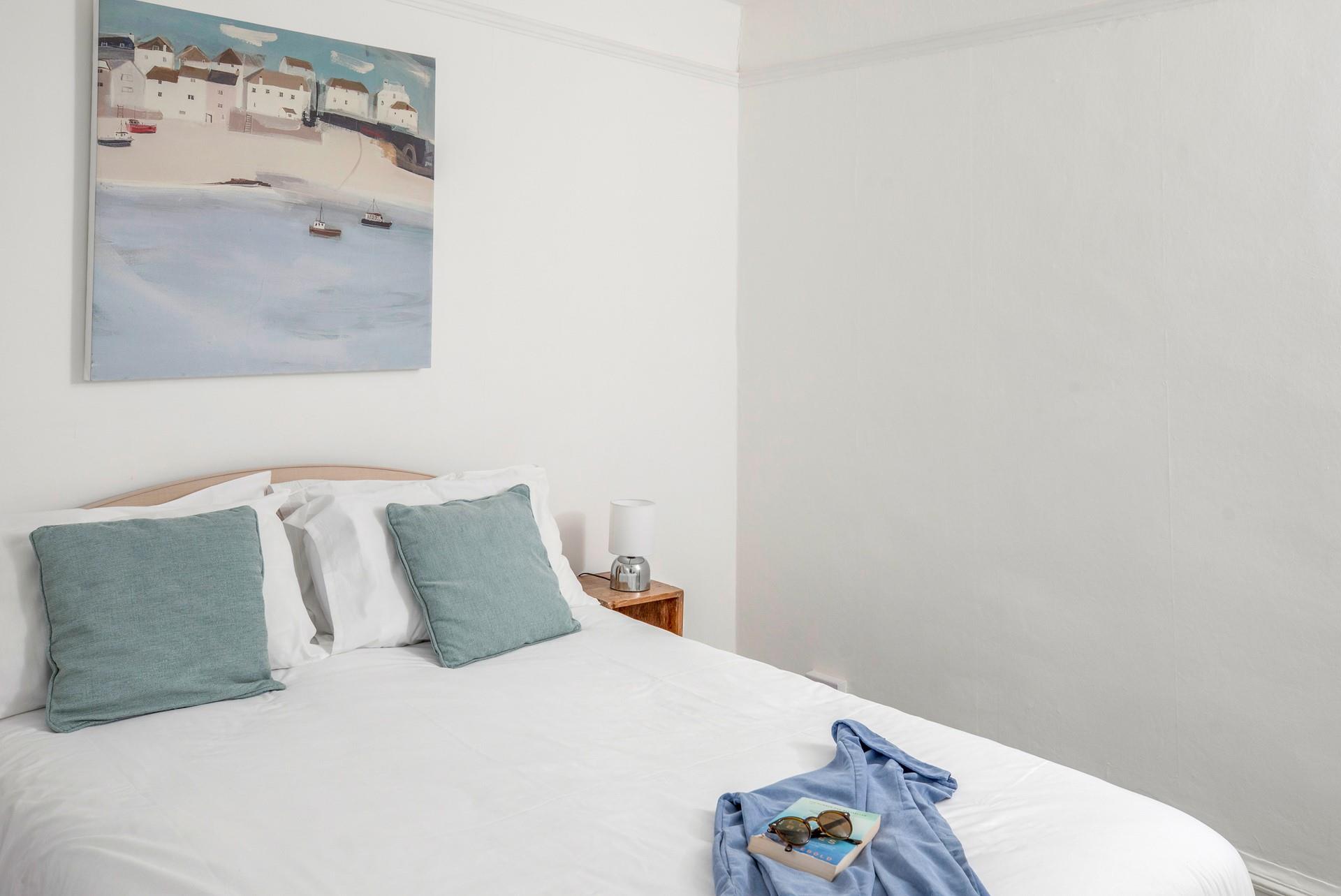 Climb into the soft sheets in the king size bed for a dreamy sleep.