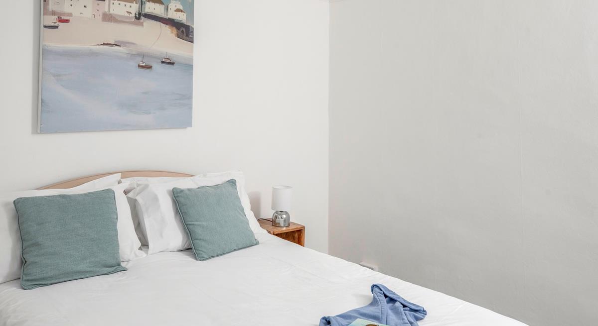 Climb into the soft sheets in the king size bed for a dreamy sleep.