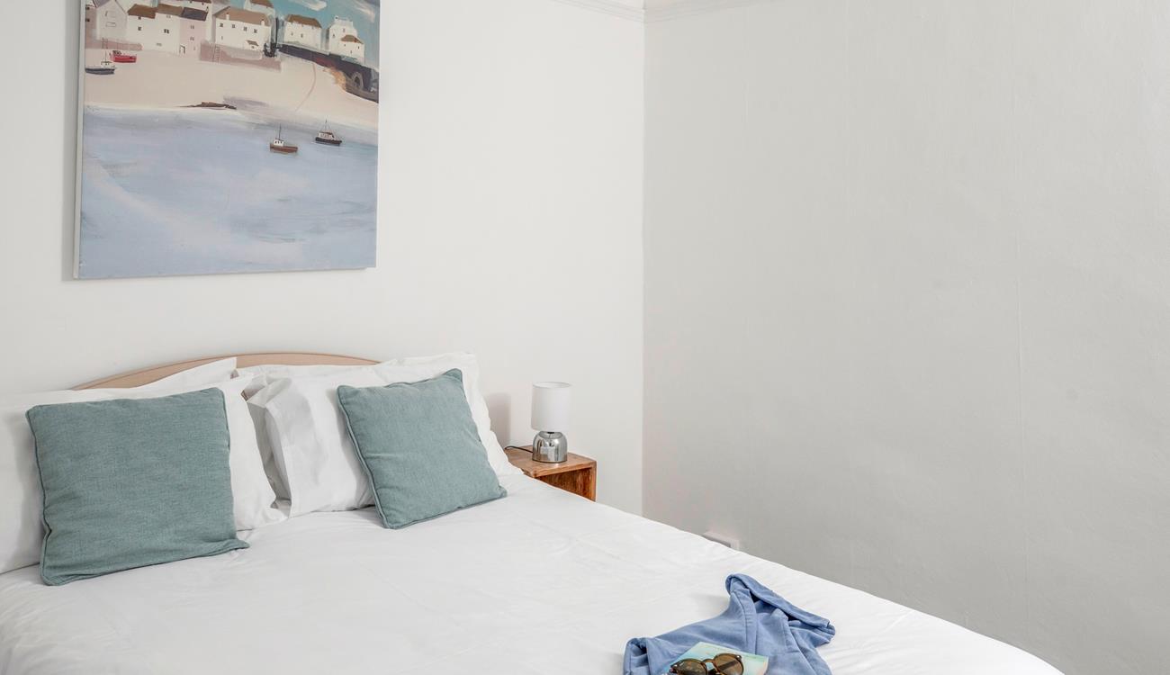 Climb into the soft sheets in the king size bed for a dreamy sleep.