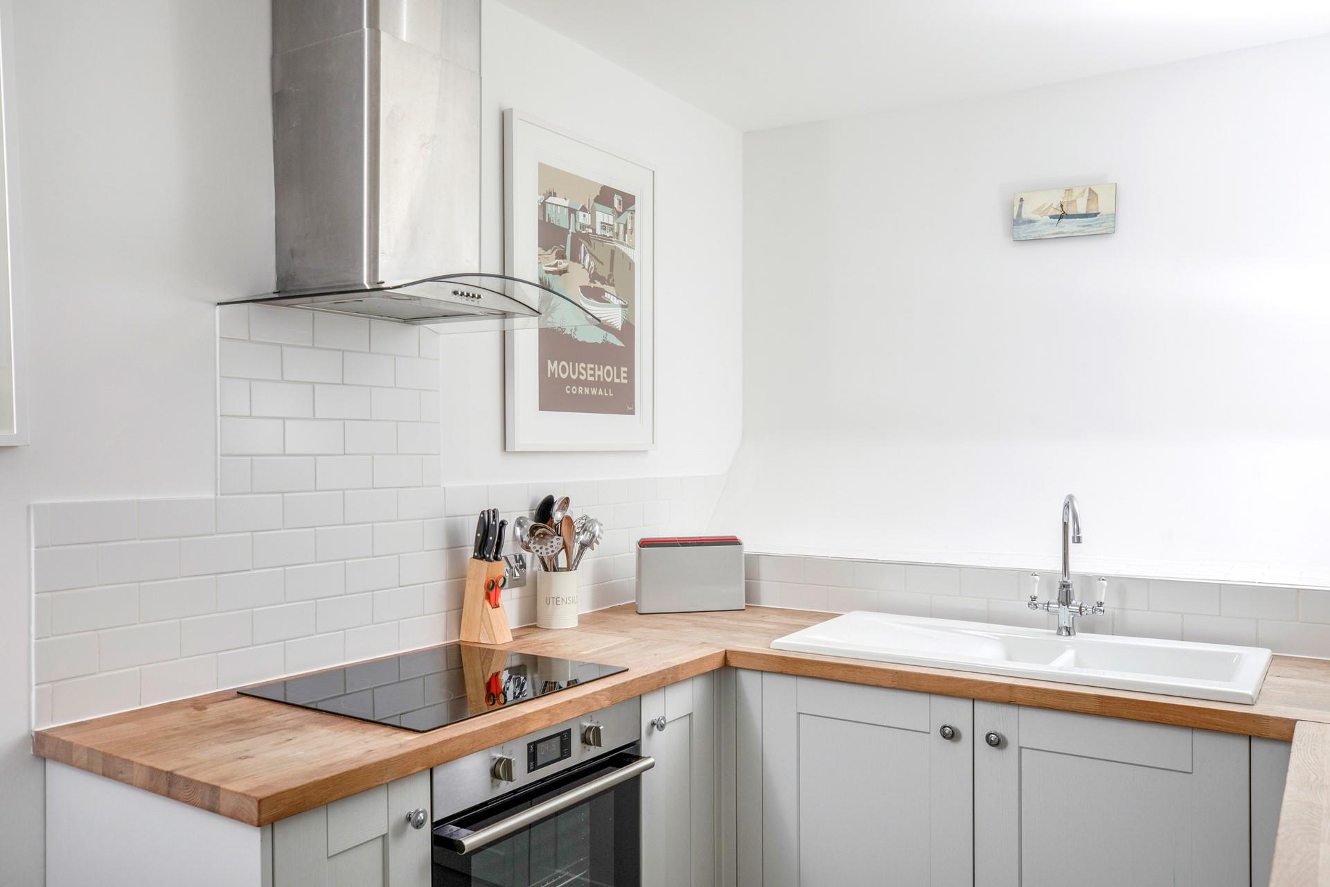 The kitchen is modern and stylish, perfect for rustling up tasty meals.