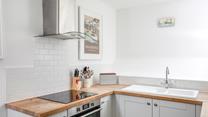 The kitchen is modern and stylish, perfect for rustling up tasty meals.
