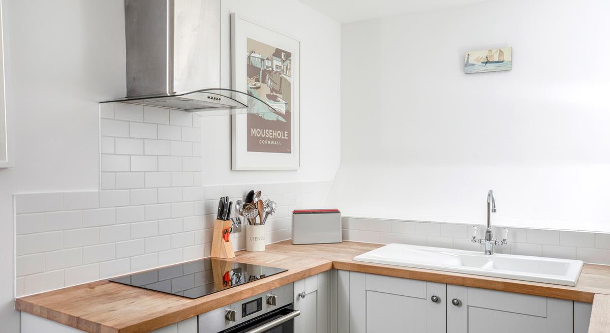 The kitchen is modern and stylish, perfect for rustling up tasty meals.