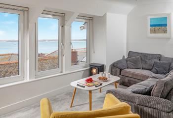 After a busy day exploring St Ives relax on the soft corner sofa with a glass of your favourite tipple and admire the view.