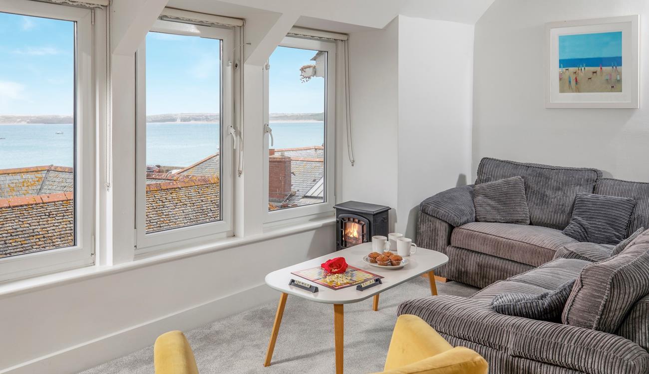 After a busy day exploring St Ives relax on the soft corner sofa with a glass of your favourite tipple and admire the view.