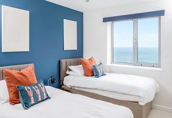 Bedroom 1 has more delightful views and with zip and link beds, this is the ideal choice for couples and/or those with children.