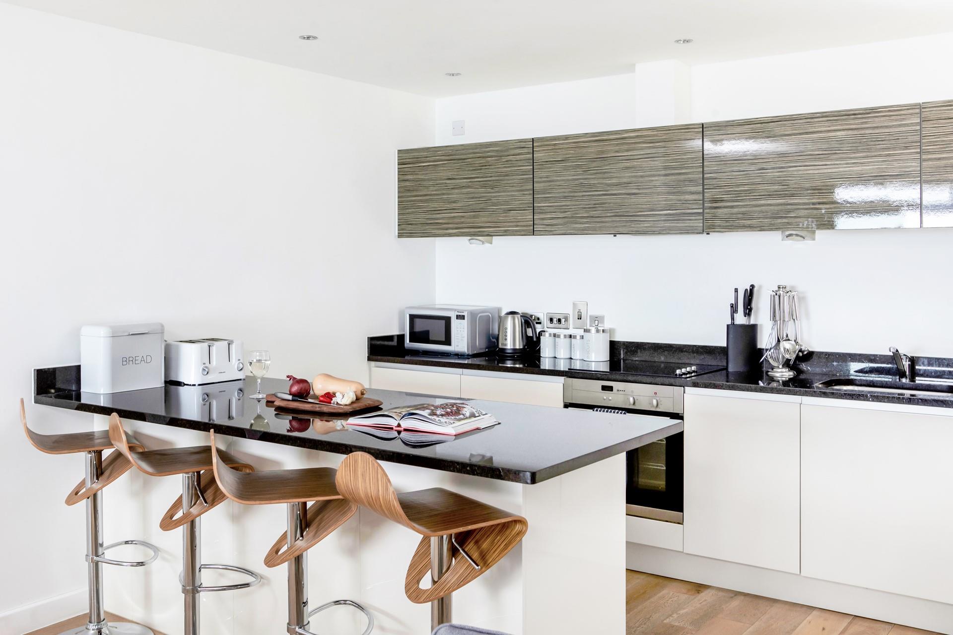 The kitchen is ideal for foodies, cooking up local produce, with a glass in hand.