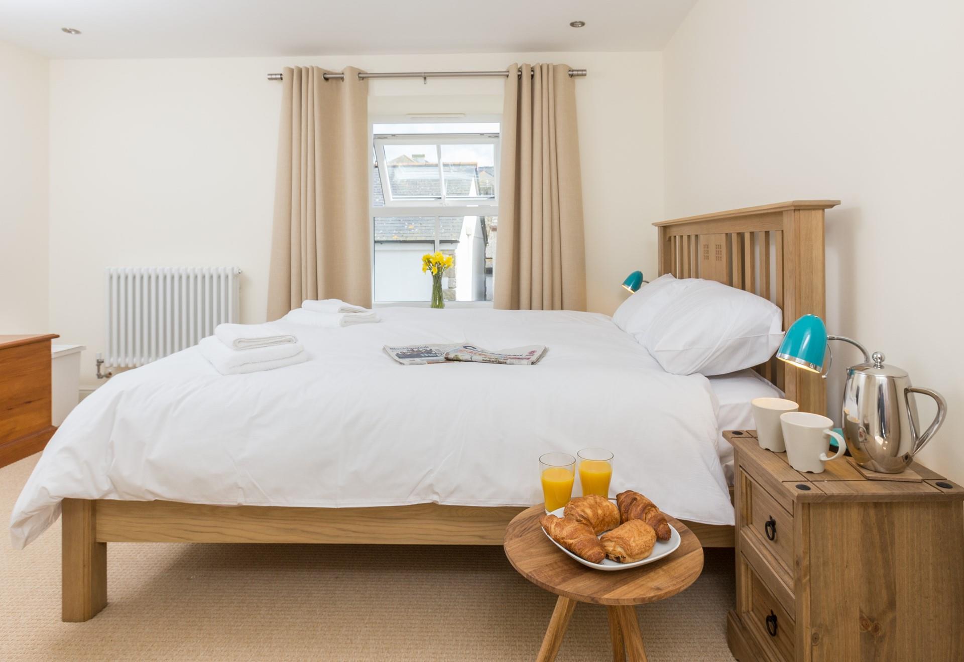 Bedroom 1 on the first floor has a deep king size bed. 