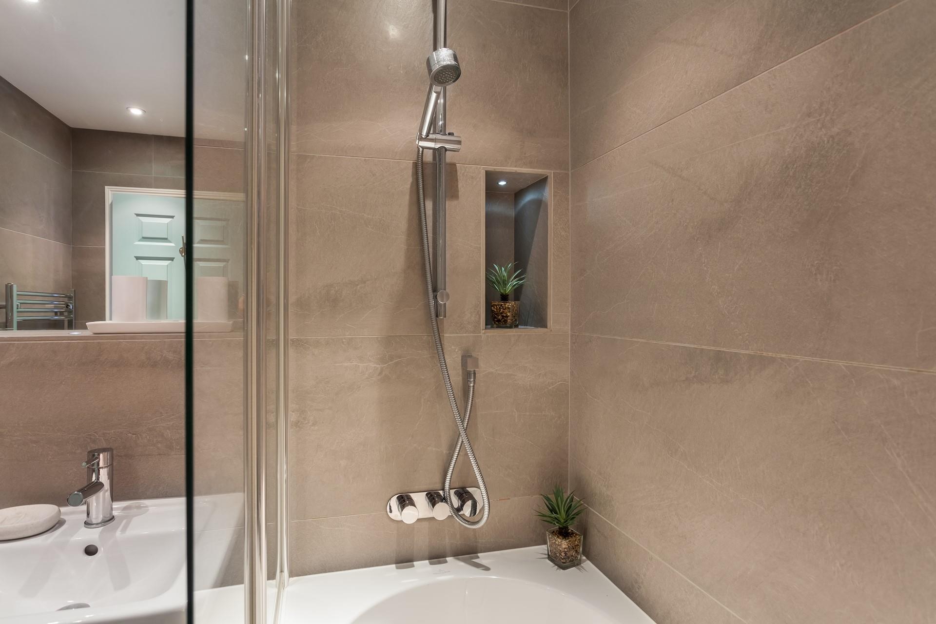 Wash off your sandy toes in the shower ready for a cosy evening in.