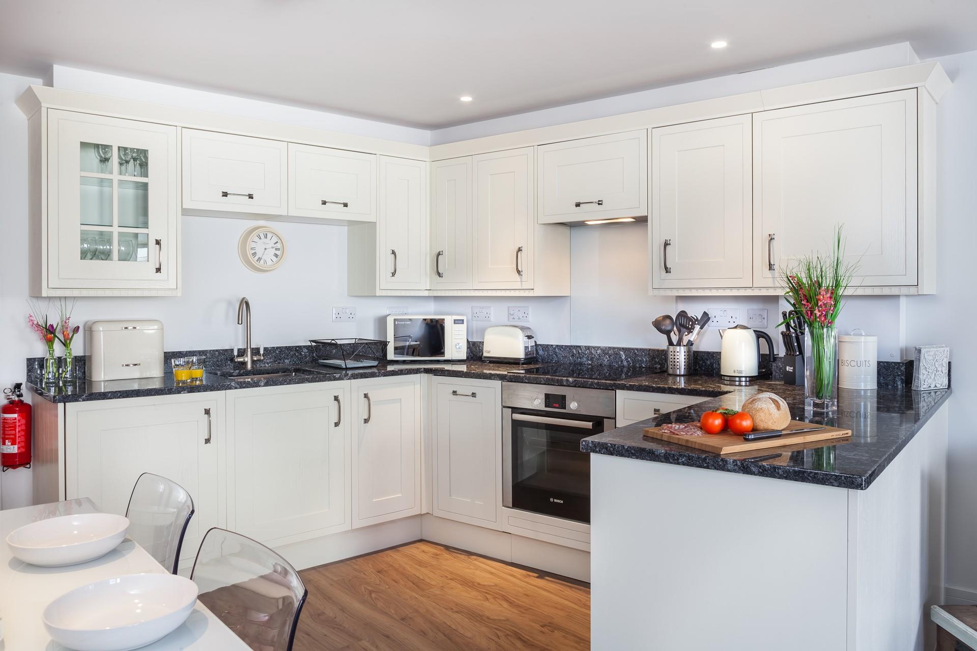 The modern kitchen makes cooking meals for your family to enjoy easy.