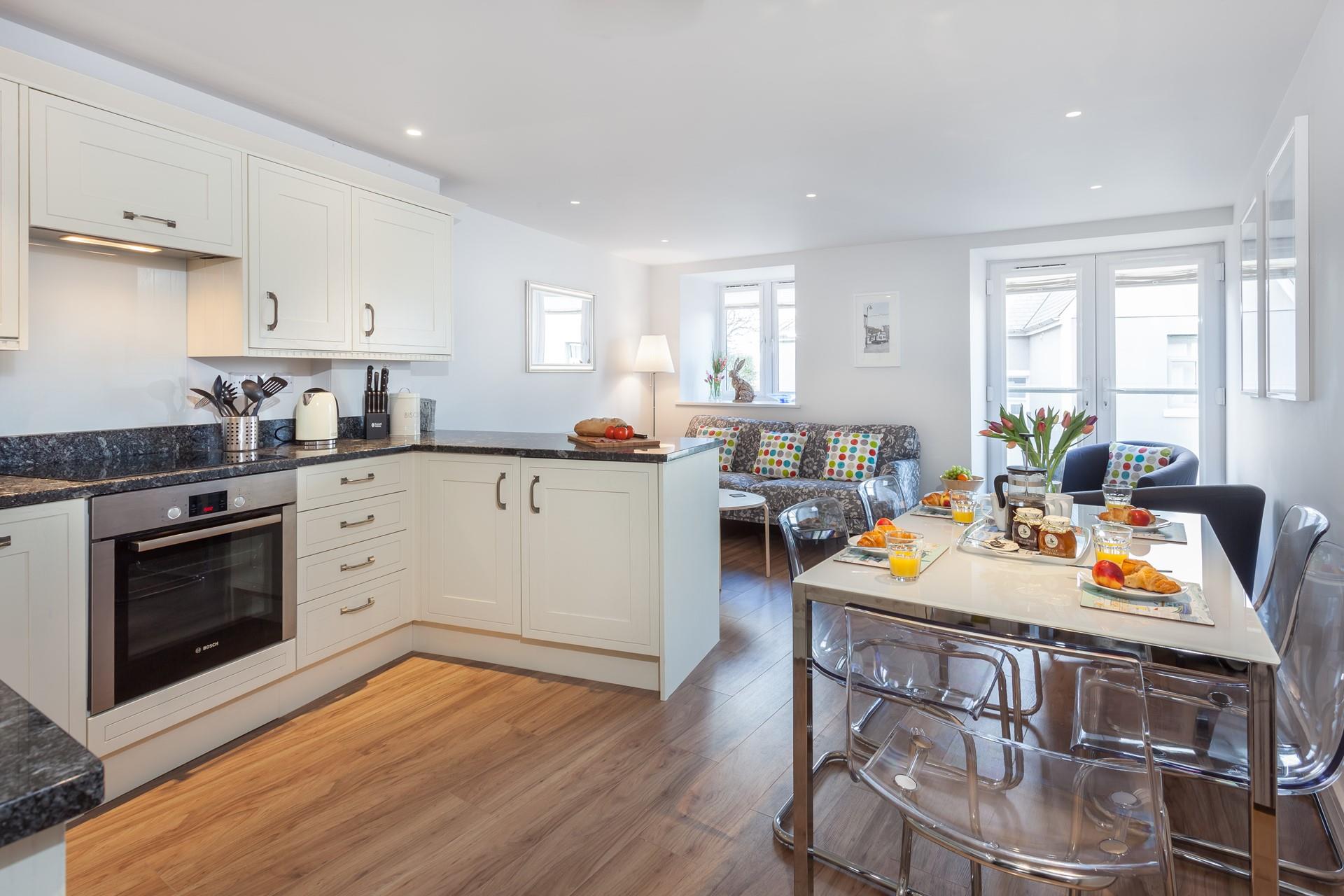 A light and contemporary apartment, 5 Sunday School Court is perfect for both couples and small families. 