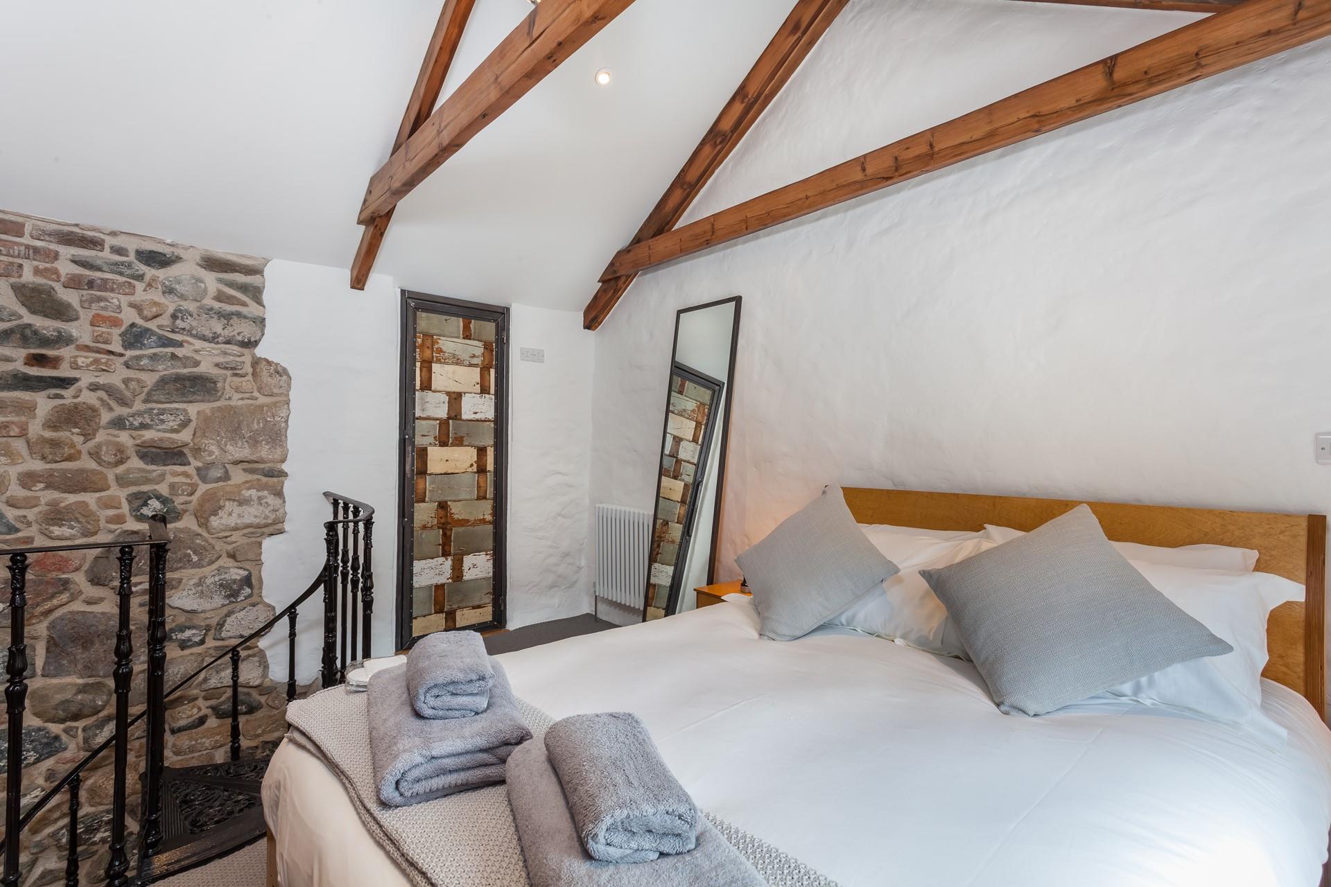 The king size bed promises a blissful night's sleep.