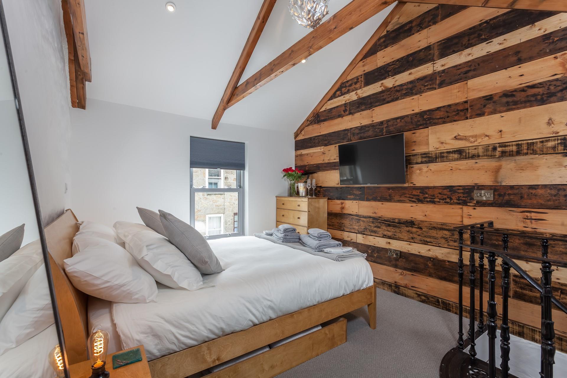 Traditional features can be found throughout the property, seamlessly blending with modern decor to create a cosy couple's bolthole.