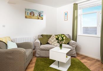 The cosy sitting room provides you with a haven of relaxation in the evenings.
