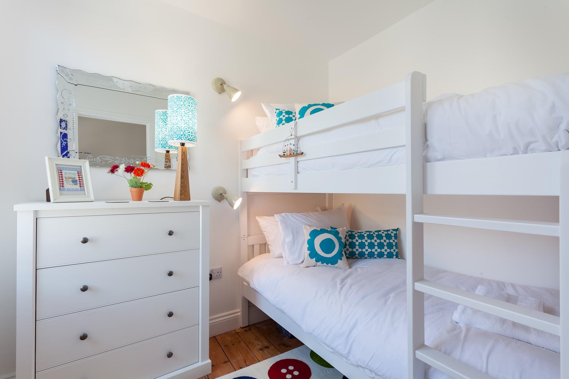 The kids will love climbing into the bunk beds in the evening.