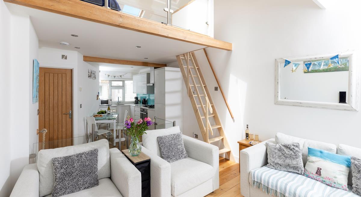 Relax after a day spent on the beach with a glass of something cold in hand.