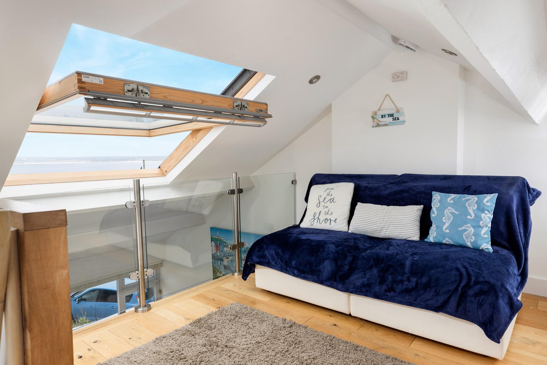 Settle down in the snug with a good book and let the sun fill the room.