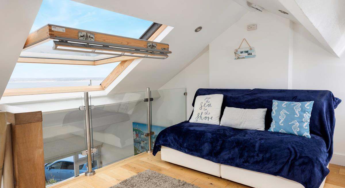 Settle down in the snug with a good book and let the sun fill the room.