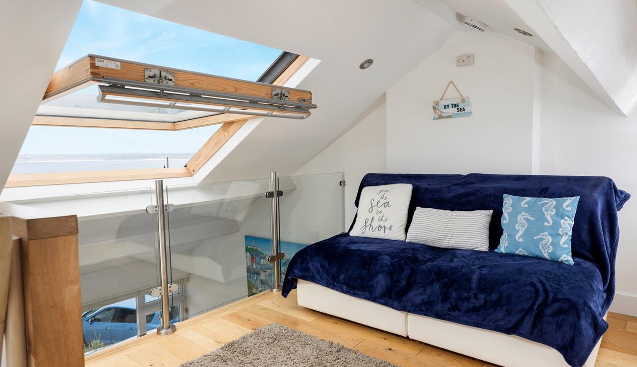 Settle down in the snug with a good book and let the sun fill the room.