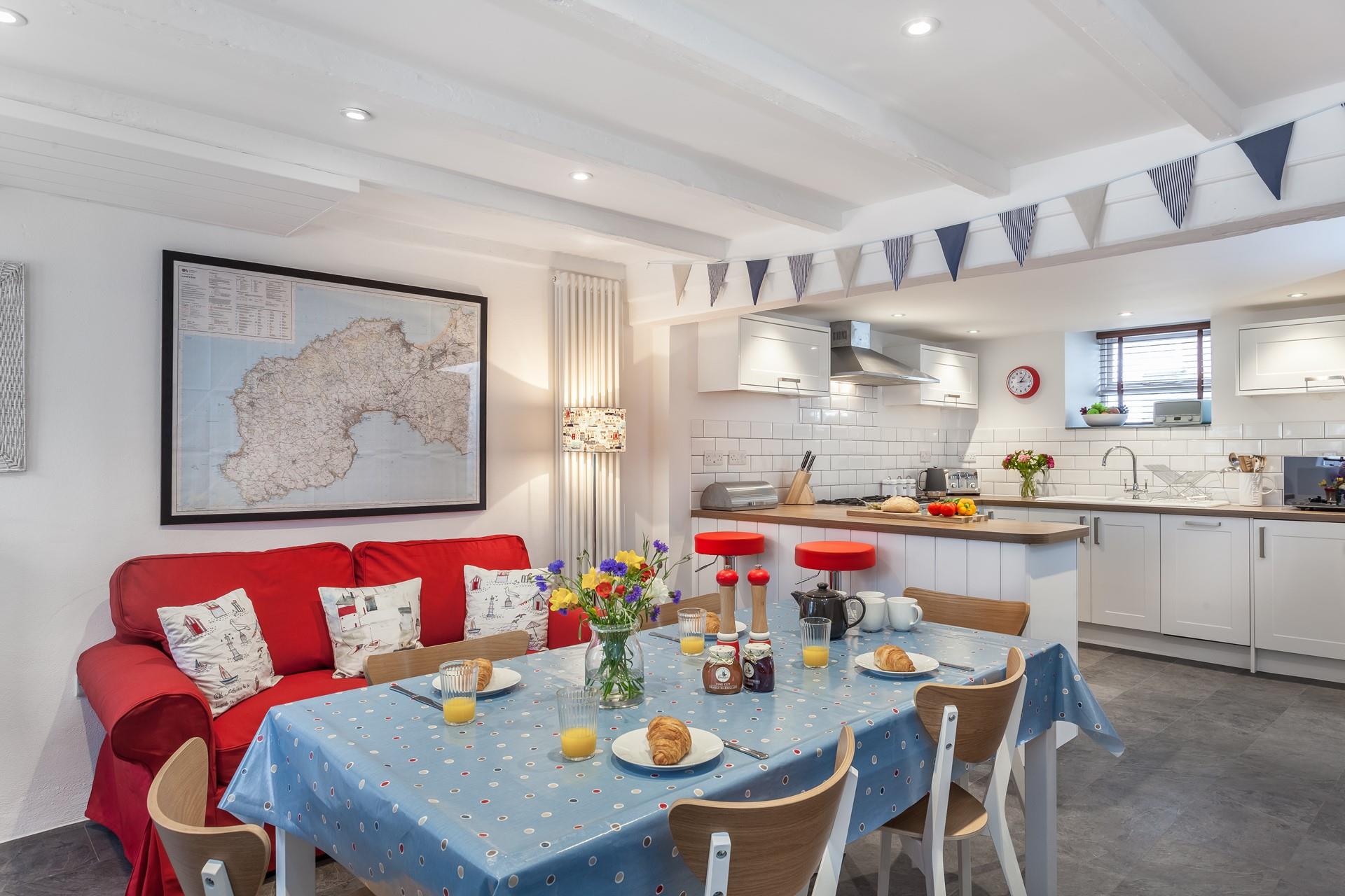 The spacious kitchen/dining room is where you can enjoy family breakfasts together.