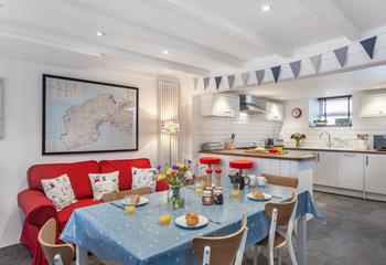 The spacious kitchen/dining room is where you can enjoy family breakfasts together.
