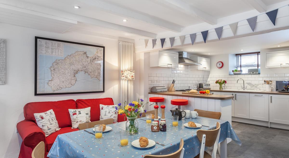 The spacious kitchen/dining room is where you can enjoy family breakfasts together.