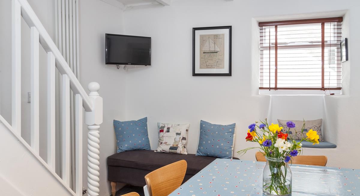 Wander up the stairs to relax in the sitting room.