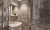 The stylish en suite shower room provides you with a base to get ready in the mornings. - Thumbnail Image