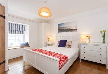 Bedroom 4 is located on the 2nd floor and features blue and red interiors providing you with a cosy base to rest your head.