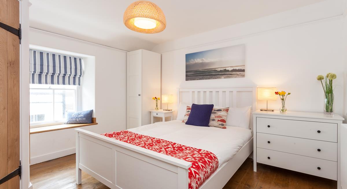 Bedroom 4 is located on the 2nd floor and features blue and red interiors providing you with a cosy base to rest your head.