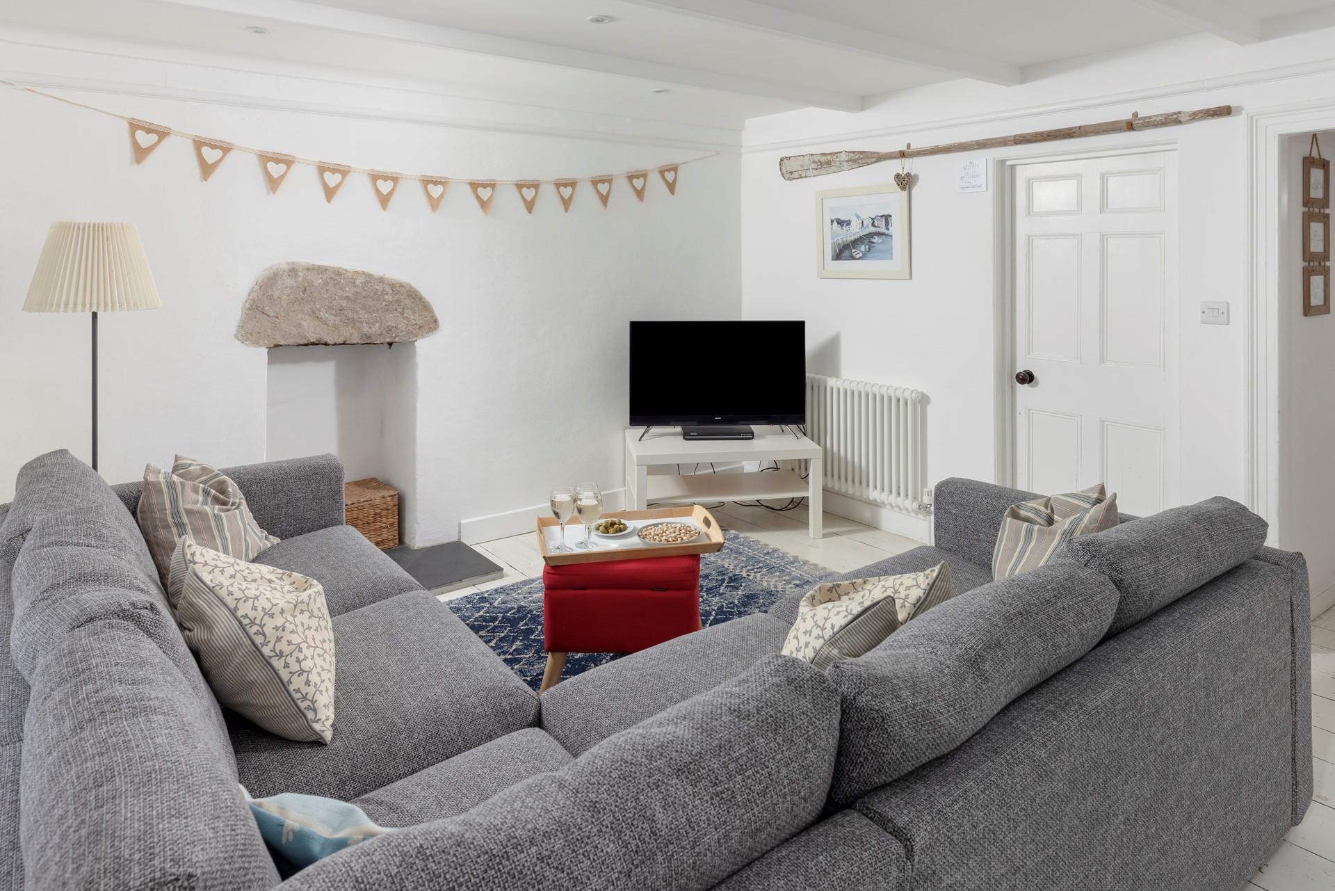 Put your feet up in the cosy sitting room and put a good film on the TV.