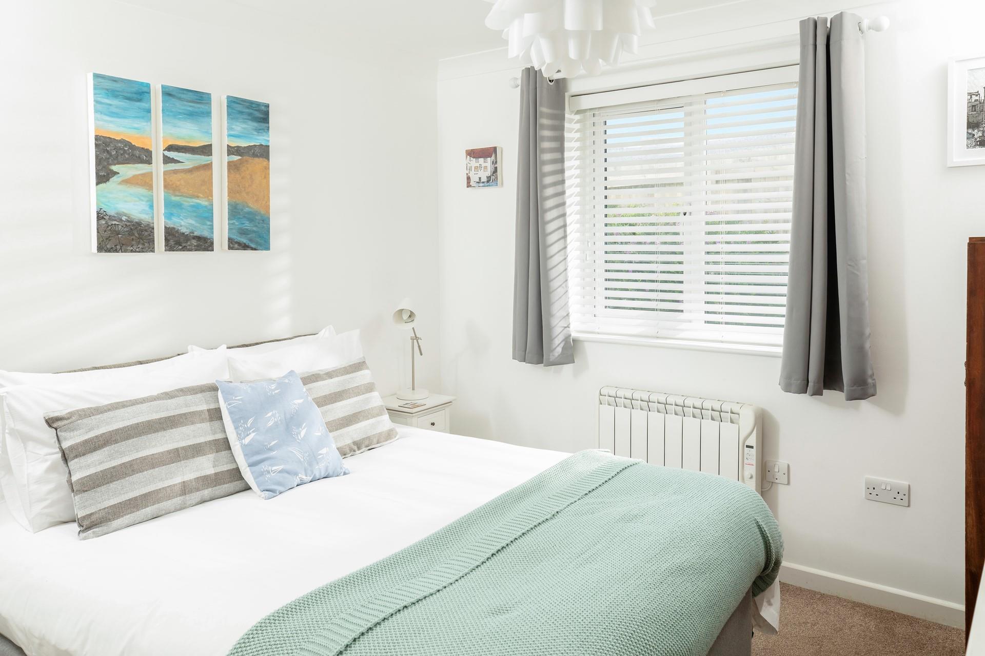 Bedroom 2 has zip and link beds allowing you to use this as a twin or king room. 