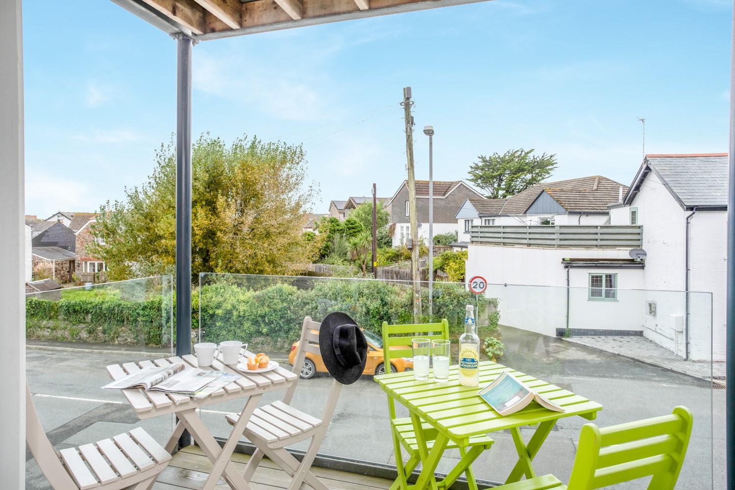The balcony is perfect for catching rays of sunshine in the morning and evening.