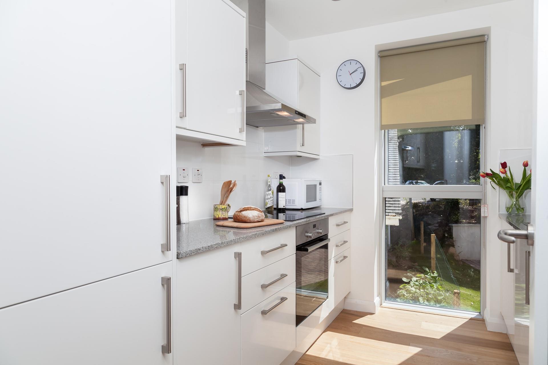 The well-equipped kitchen is great for preparing meals with local ingredients.