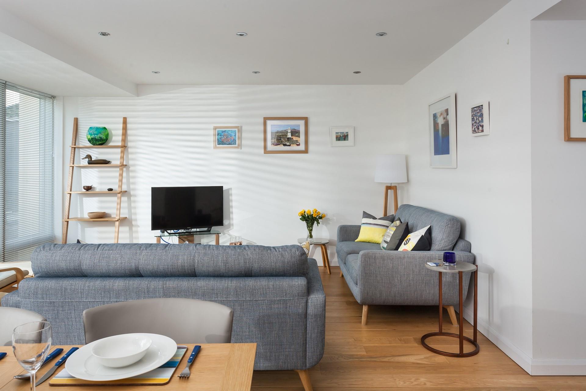 Wander out of bed in the morning to sip your coffee in your cosy living area.