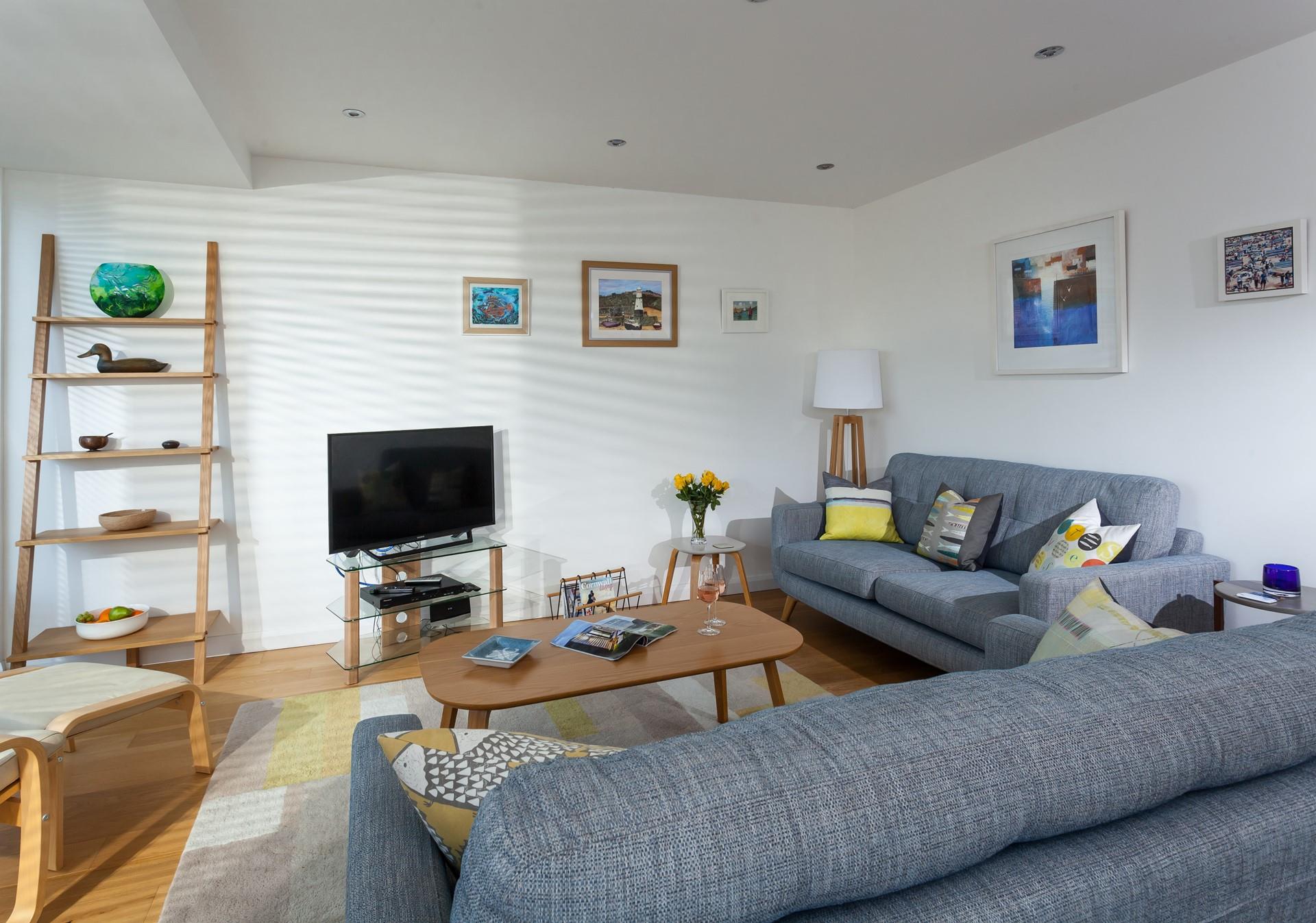 After a day of watersports on Porthminster beach, sink into the sofa for a relaxing evening with a bottle of wine.