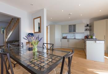 The open plan kitchen and living area provides the perfect space to cook and relax in the evenings.