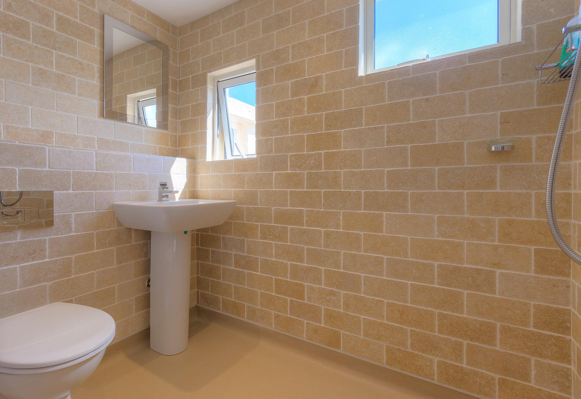 Wash off your sandy toes in the ground floor wet room.