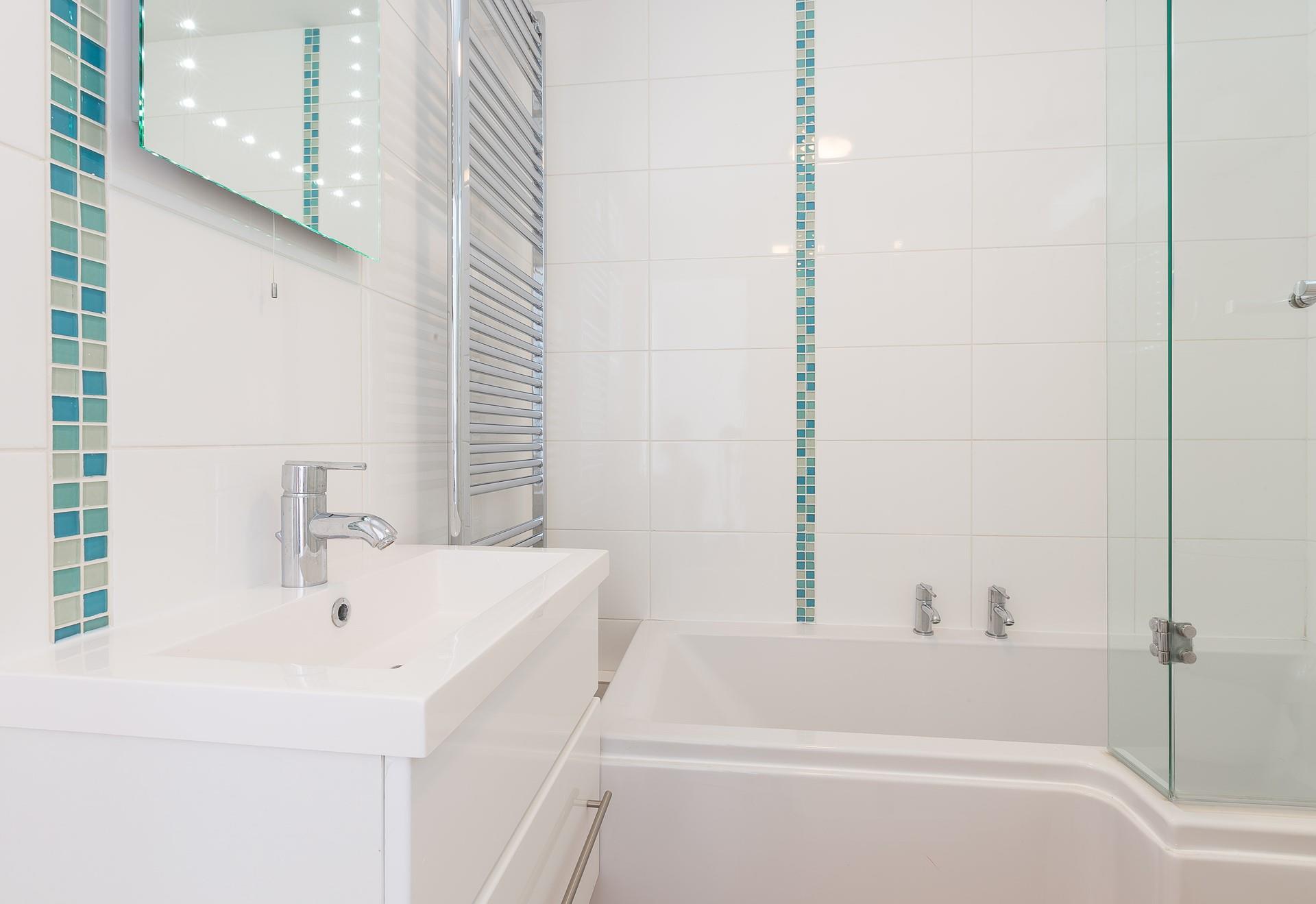 Modern bathroom on first floor.