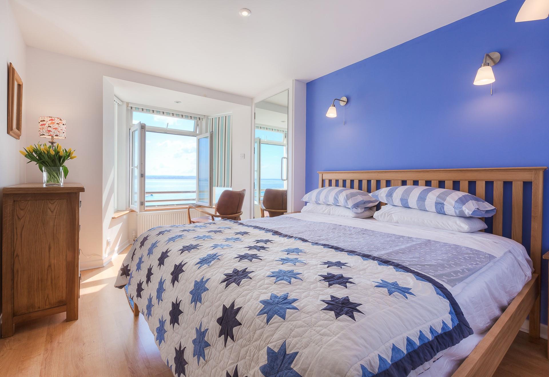 Settle into your spacious king size bed watching the sun go down from your window.