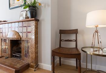 The unique decorative fireplace exudes charm and character.