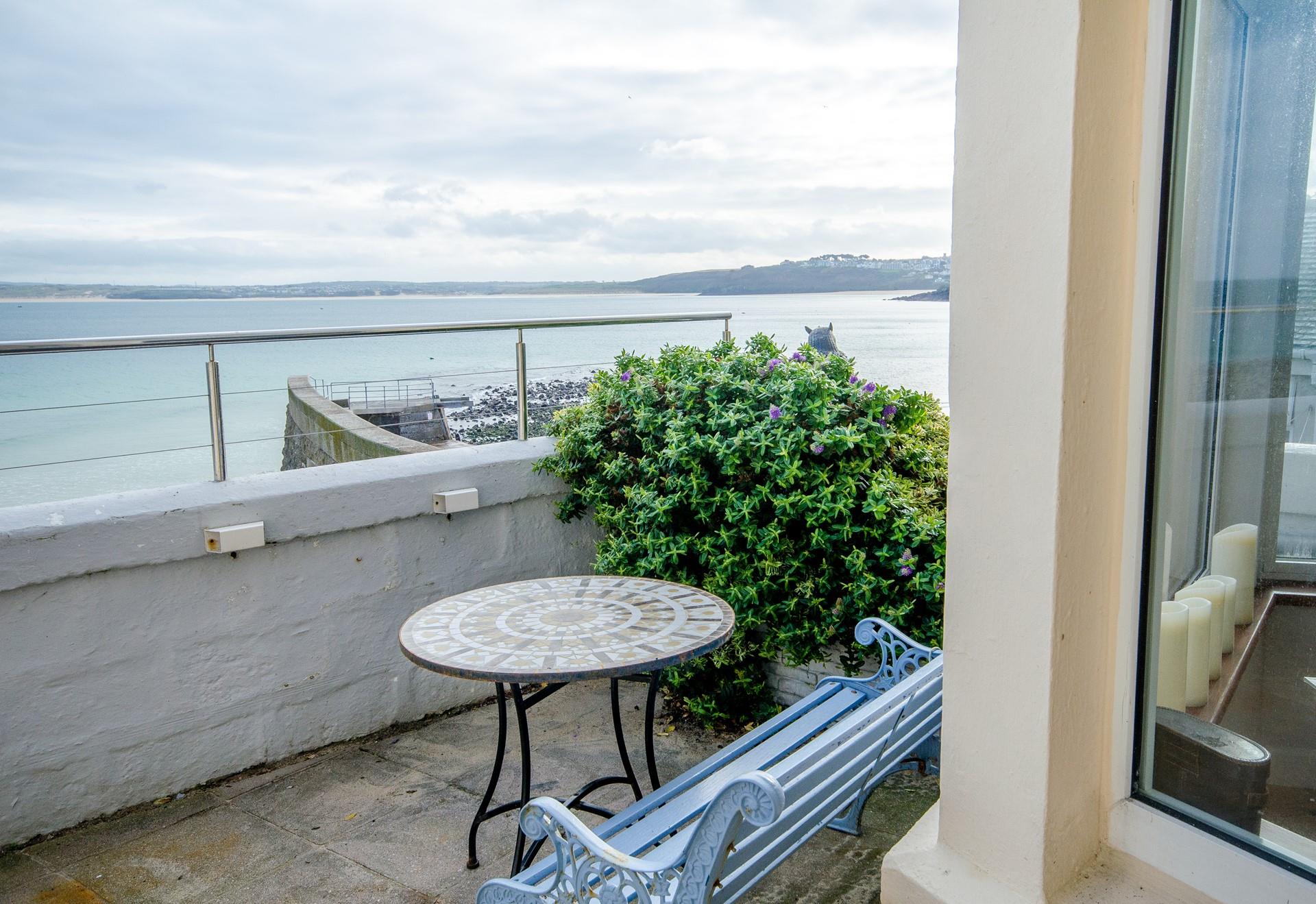 The seating area is perfect for catching the sun and taking in the views. 