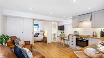 The living area is open plan, creating a delightful free-flowing space to cook and relax in.