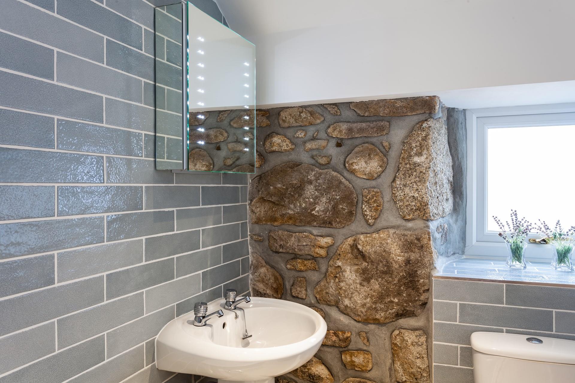 Head out for an evening of fine dining after getting ready in the modern bathroom.