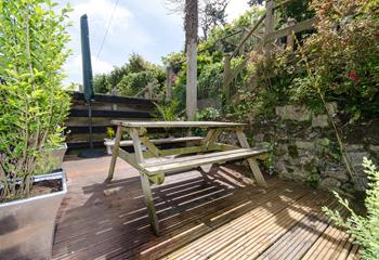 The decking provides the perfect place for a picnic or to tuck yourself away with a book!