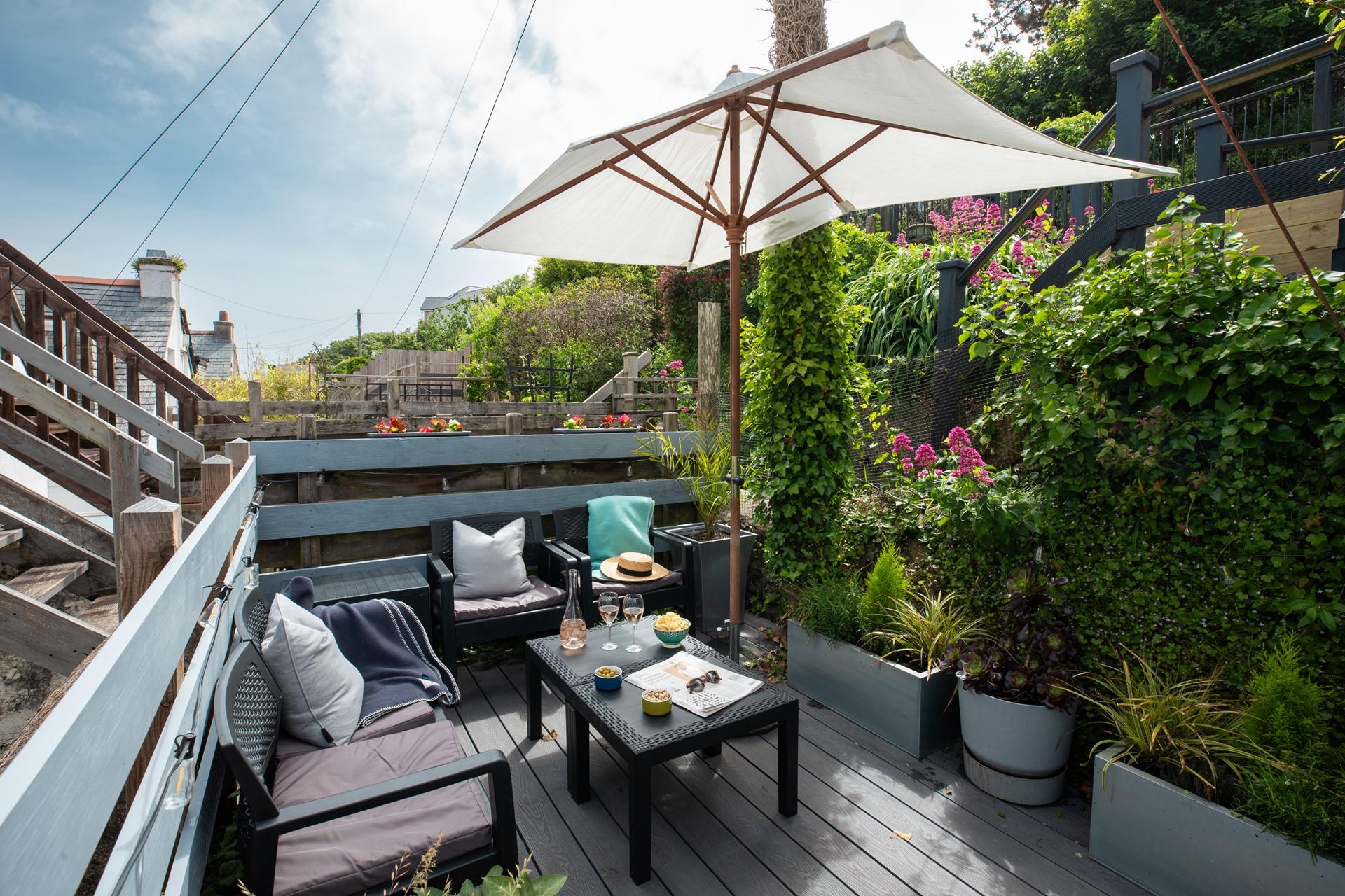 The decking provides the perfect place for a picnic or to tuck yourself away with a book!