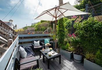 The decking provides the perfect place for a picnic or to tuck yourself away with a book!