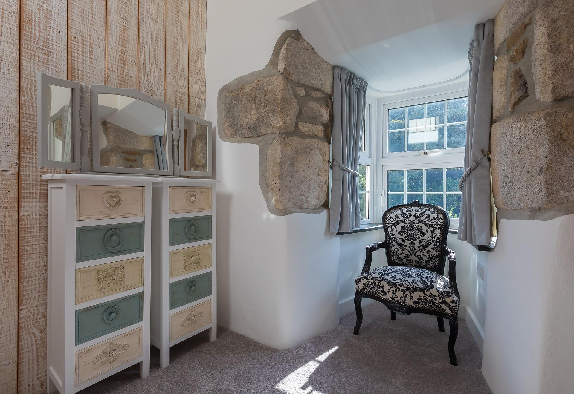 This quiet corner is perfect for tucking yourself away and enjoying a good book.