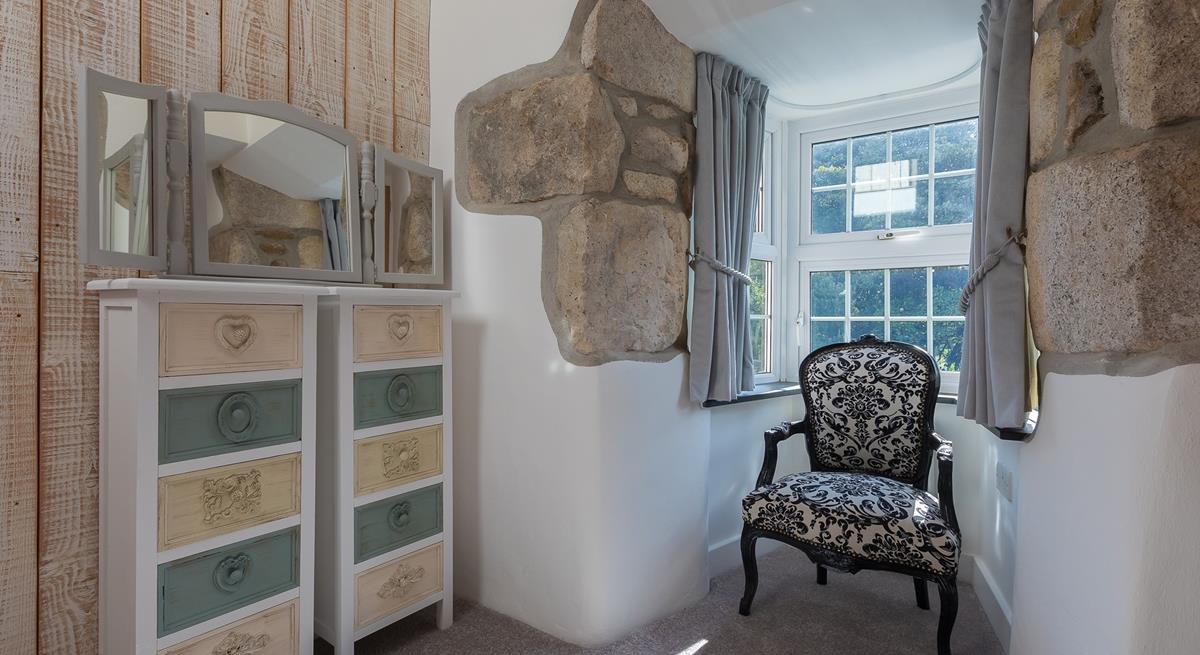 This quiet corner is perfect for tucking yourself away and enjoying a good book.